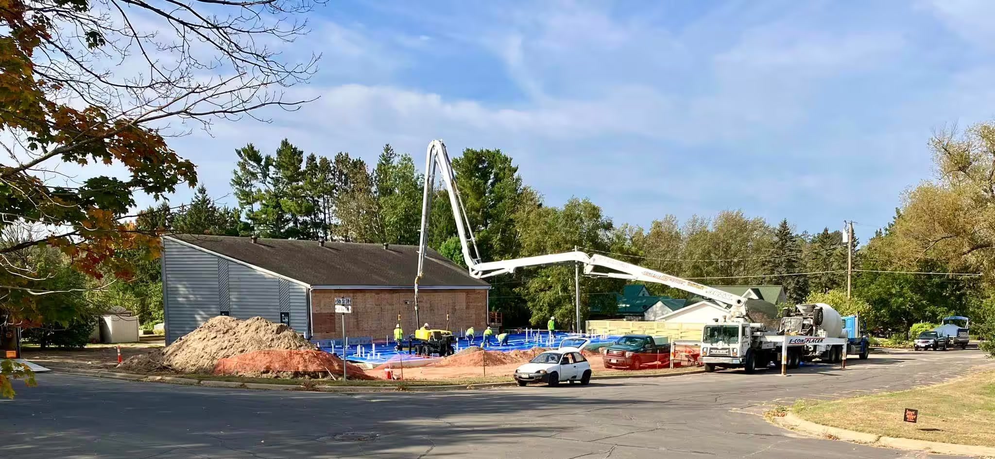 Concrete pump truck pouring the new foundation