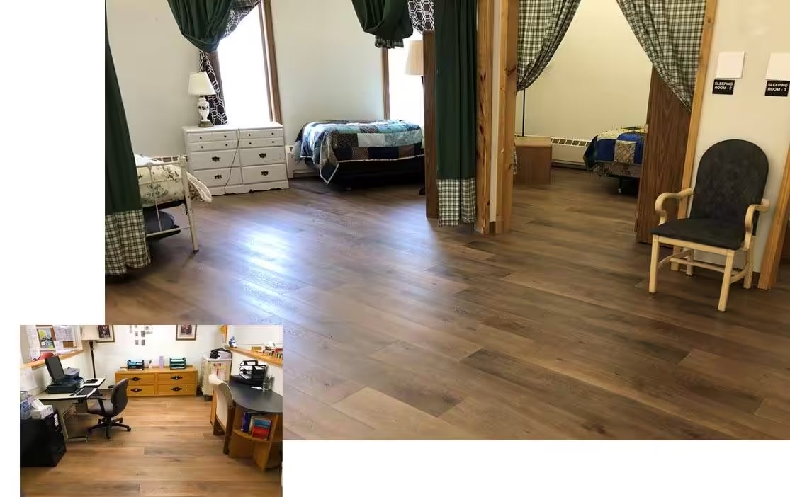 Inside Grace House — private sleeping quarters with quilted beds and curtain dividers, and the office resource corner